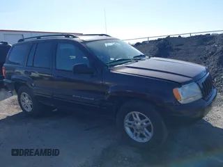 2004 Jeep Grand Cherokee with VIN 1J8GX48S24C266933, listed as a IAAI auction lot 41497122 with 200,899 mi miles and . Bid and sale history available at DreamBid. Image 16.