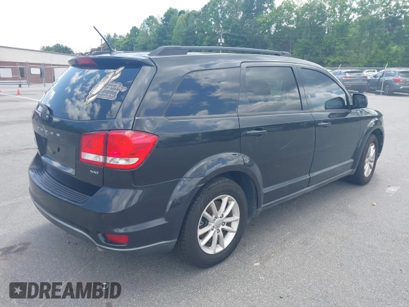 2013 Dodge Journey SXT with VIN 3C4PDCBG6DT501871, listed as a IAAI auction lot 42553305 with 184,226 mi miles and . Bid and sale history available at DreamBid. Image 4.