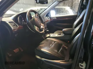 2012 Jeep Grand Cherokee Limited z VIN 1C4RJFBTXCC184445, wystawiony jako Copart lot #57471505 z przebiegiem 223 090 mil mil oraz Czysty tytuł • Clean title. Historia ofert i sprzedaży dostępna na DreamBid. Obrazek 7.