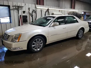 2009 Cadillac DTS 1SA z VIN 1G6KD57YX9U126395, wystawiony jako Copart lot #46072925 z przebiegiem 76 302 mil mil oraz Szkoda całkowita • Salvage title. Historia ofert i sprzedaży dostępna na DreamBid. Obrazek 1.