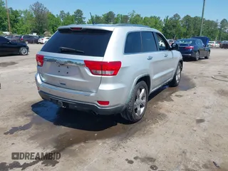 2011 Jeep Grand Cherokee Overland with VIN 1J4RR6GGXBC526649, listed as a IAAI auction lot 42162327 with 185,129 mi miles and . Bid and sale history available at DreamBid. Image 4.