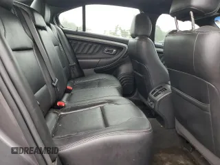 2013 Ford Taurus SEL z VIN 1FAHP2E87DG104349, wystawiony jako Copart lot #57143135 z przebiegiem 129 927 mil mil oraz Szkoda całkowita • Salvage title. Historia ofert i sprzedaży dostępna na DreamBid. Obrazek 10.
