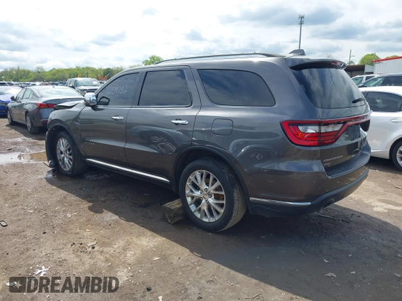 2014 Dodge Durango Citadel with VIN 1C4RDJEG7EC493379, listed as a IAAI auction lot 42159732 with 184,373 mi miles and . Bid and sale history available at DreamBid. Image 3.