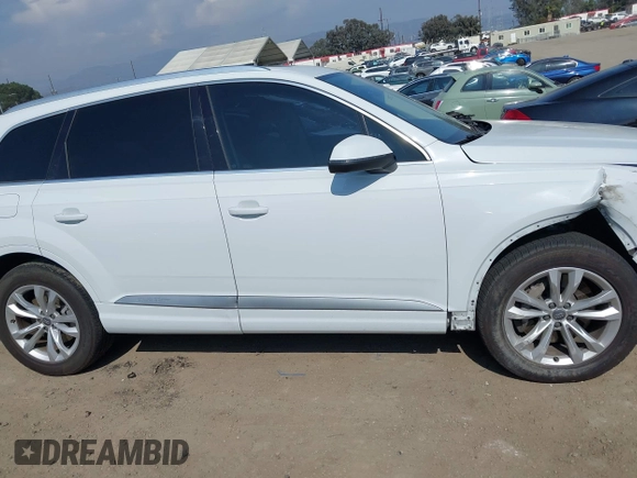 2019 Audi Q7 Premium with VIN WA1AAAF74KD004991, listed as a IAAI auction lot 42180183 with 53,188 mi miles and . Bid and sale history available at DreamBid. Image 14.