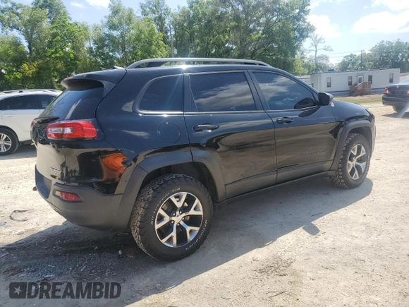 2017 Jeep Cherokee Trailhawk L Plus with VIN 1C4PJMBBXHW517252, listed as a Copart auction lot 51414315 with 185,274 mi miles and Salvage Title. Bid and sale history available at carsss.com. Image 3.