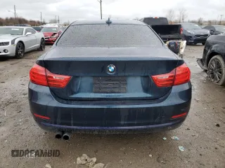 2015 BMW 4 Series 428i xDrive z VIN WBA3N5C5XFK198714, wystawiony jako Copart lot #49602865 z przebiegiem 100 664 mil mil oraz Szkoda całkowita • Salvage title. Historia ofert i sprzedaży dostępna na DreamBid. Obrazek 6.