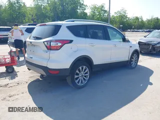 2018 Ford Escape Titanium с VIN 1FMCU9J96JUD11473, выставлен на аукционе IAAI как лот 42402996 с пробегом 110 388 миль миль и . История ставок и продаж доступна на DreamBid. Изображение 4.