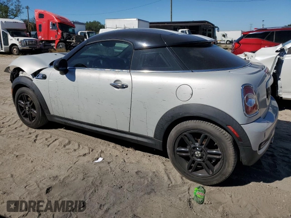 2014 MINI Coupe S z VIN WMWSX3C57ET409158, wystawiony jako Copart lot #81650034 z przebiegiem 118 523 mil mil oraz Szkoda całkowita • Salvage title. Historia ofert i sprzedaży dostępna na DreamBid. Obrazek 2.