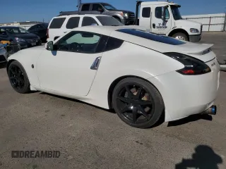 2012 Nissan 370Z с VIN JN1AZ4EH2CM565026, выставлен на аукционе Copart как лот 56129015 с пробегом 113 456 миль миль и Списание • Salvage title. История ставок и продаж доступна на DreamBid. Изображение 2.