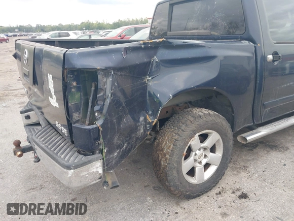 2007 Nissan Titan XE with VIN 1N6BA07AX7N236492, listed as a IAAI auction lot 41668602 with 205,028 mi miles. Bid and sale history available at carsss.com. Image 6.