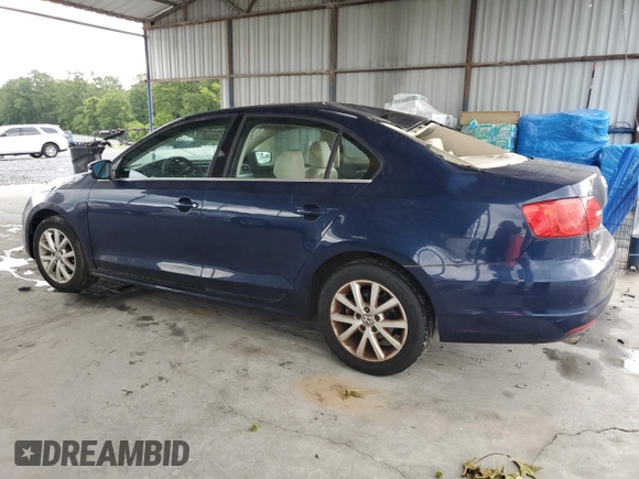 2013 Volkswagen Jetta SE with VIN 3VWDP7AJXDM379392, listed as a Copart auction lot 61598235 with 119,005 mi miles and Salvage title. Bid and sale history available at DreamBid. Image 2.