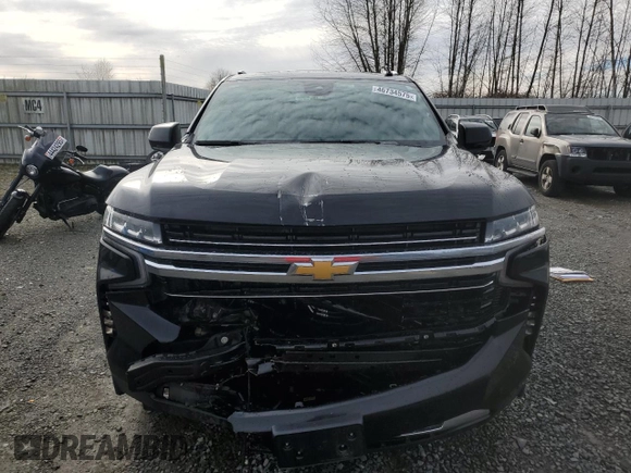 2023 Chevrolet Suburban LT with VIN 1GNSCCKD3PR125671, listed as a Copart auction lot 46734575 with 158,217 mi miles and Salvage title. Bid and sale history available at DreamBid. Image 5.