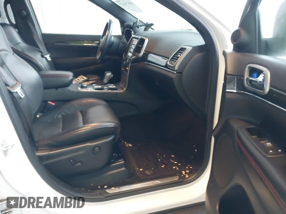 2018 Jeep Grand Cherokee Trailhawk with VIN 1C4RJFLGXJC264438, listed as a IAAI auction lot 40974417 with 117,717 mi miles and . Bid and sale history available at DreamBid. Image 5.