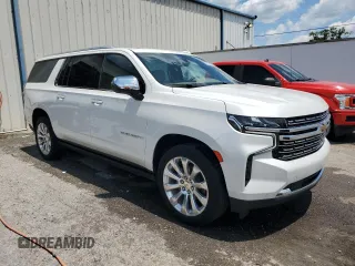 2023 Chevrolet Suburban Premier with VIN 1GNSCFKD7PR205475, listed as a Copart auction lot 60704235 with 32,208 mi miles and Clean title. Bid and sale history available at DreamBid. Image 4.