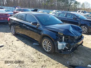 2016 Toyota Avalon XLE Premium z VIN 4T1BD1EB8GU050656, wystawiony jako IAAI lot #41472112 z przebiegiem 183 597 mil mil oraz . Historia ofert i sprzedaży dostępna na DreamBid. Obrazek 1.