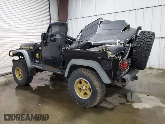 2006 Jeep Wrangler Sport z VIN 1J4FA49SX6P718734, wystawiony jako Copart lot #56516095 z przebiegiem 127 184 mil mil oraz Szkoda całkowita • Salvage title. Historia ofert i sprzedaży dostępna na DreamBid. Obrazek 2.