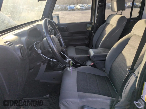 2008 Jeep Wrangler Unlimited X with VIN 1J4GA39108L509275, listed as a Copart auction lot 52386455 with 220,829 mi miles and Salvage Title. Bid and sale history available at carsss.com. Image 7.