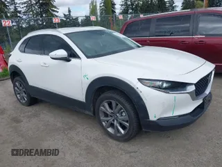 2023 Mazda CX-30 2.5 S Premium Package with VIN 3MVDMBDM7PM522287, listed as a IAAI auction lot 42052660 with 41,336 mi miles. Bid and sale history available at carsss.com. Image 1.