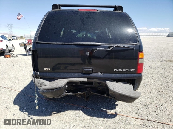 2002 Chevrolet Tahoe LT z VIN 1GNEK13T42R152851, wystawiony jako Copart lot #67958403 z przebiegiem 257 989 mil mil oraz Szkoda całkowita • Salvage title. Historia ofert i sprzedaży dostępna na DreamBid. Obrazek 6.