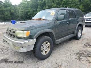 1999 Toyota 4Runner SR5 z VIN JT3HN86R7X0212420, wystawiony jako Copart lot #61010125 z przebiegiem 265 015 mil mil oraz Czysty tytuł • Clean title. Historia ofert i sprzedaży dostępna na DreamBid. Obrazek 1.