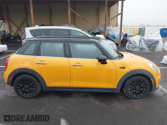 2018 MINI Hardtop 4 Door Cooper with VIN WMWXU1C59J2F79169, listed as a IAAI auction lot 40973679 with 97,507 mi miles and . Bid and sale history available at DreamBid. Image 13.