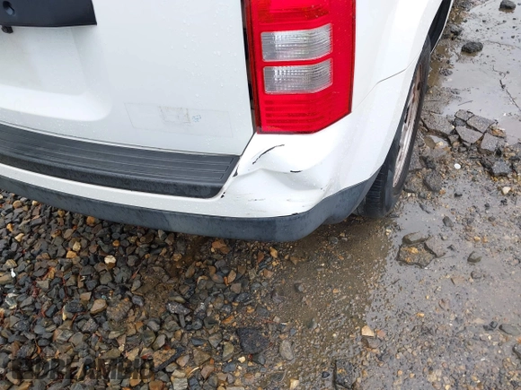 2013 Jeep Patriot Sport with VIN 1C4NJPBA8DD223029, listed as a IAAI auction lot 41765589 with 164,590 mi miles. Bid and sale history available at carsss.com. Image 6.