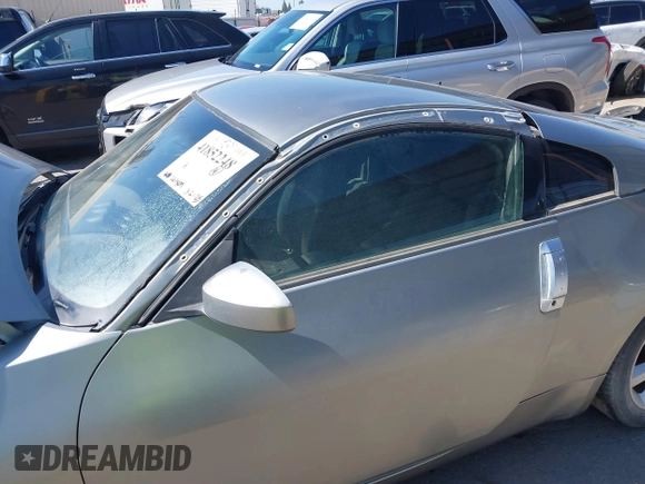 2005 Nissan 350Z 35th Anniversary Edition z VIN JN1AZ34D15M608766, wystawiony jako IAAI lot #41852248 z przebiegiem 261 809 mil mil oraz . Historia ofert i sprzedaży dostępna na DreamBid. Obrazek 6.