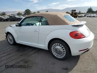 2015 Volkswagen Beetle 1.8T with VIN 3VW517AT6FM802771, listed as a Copart auction lot 72225834 with 128,946 mi miles and Salvage title. Bid and sale history available at DreamBid. Image 2.