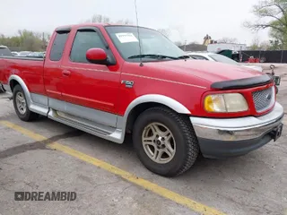 2000 Ford F-150 XL with VIN 1FTRX17L8YKA93634, listed as a IAAI auction lot 41957761 with 170,933 mi miles. Bid and sale history available at carsss.com. Image 1.