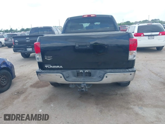 2013 Toyota Tundra Limited with VIN 5TFFY5F19DX142652, listed as a IAAI auction lot 42165369 with 152,286 mi miles and . Bid and sale history available at DreamBid. Image 16.