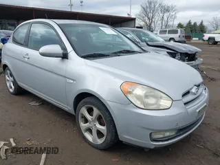 2008 Hyundai Accent SE with VIN KMHCN36C98U066340, listed as a IAAI auction lot 41737543 with 153,741 mi miles. Bid and sale history available at carsss.com. Image 1.