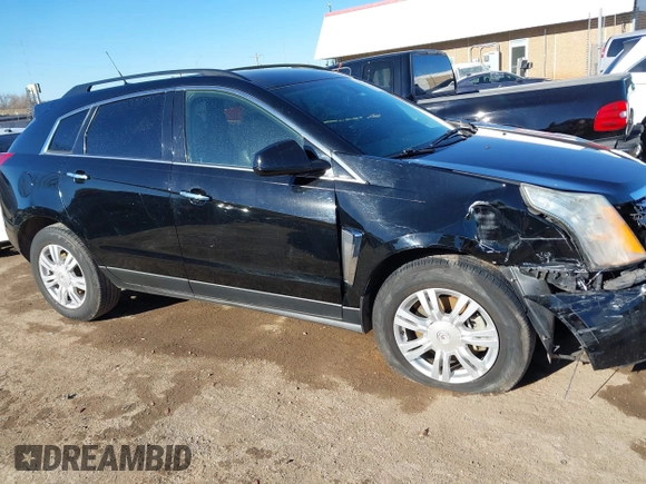 2014 Cadillac SRX with VIN 3GYFNAE32ES550136, listed as a IAAI auction lot 41219755 with 161,878 mi miles and . Bid and sale history available at DreamBid. Image 13.