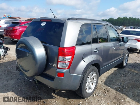 2006 Suzuki Grand Vitara Luxury z VIN JS3TE947864103082, wystawiony jako IAAI lot #42470917 z przebiegiem 155 702 mil mil oraz . Historia ofert i sprzedaży dostępna na DreamBid. Obrazek 4.