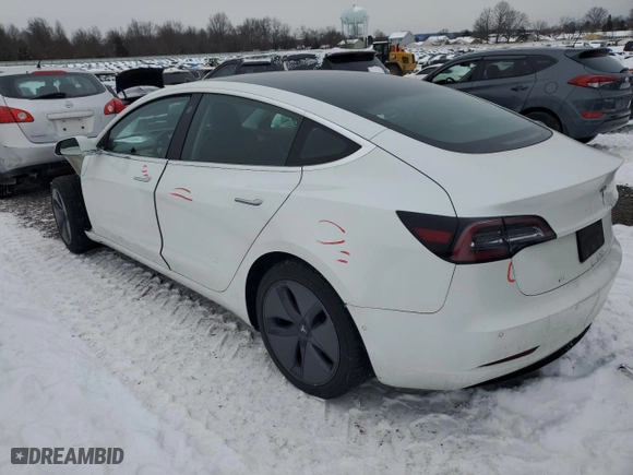 2020 Tesla Model 3 Standard Range Plus with VIN 5YJ3E1EA9LF613181, listed as a Copart auction lot 41799135 with 122,120 mi miles and Salvage Title. Bid and sale history available at carsss.com. Image 2.