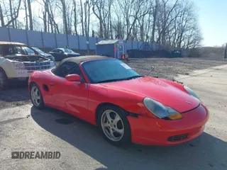 2000 Porsche Boxster z VIN WP0CA2982YU622019, wystawiony jako IAAI lot #41983172 z przebiegiem 117 575 mil mil oraz . Historia ofert i sprzedaży dostępna na DreamBid. Obrazek 1.