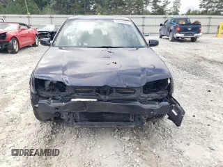 2000 Volkswagen Jetta with VIN 3VWSE29M7YM028198, listed as a Copart auction lot 73648504 with 265,184 mi miles and Salvage title. Bid and sale history available at DreamBid. Image 5.