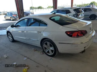 2014 Volkswagen CC R-Line with VIN WVWBP7AN6EE521807, listed as a Copart auction lot 74177764 with 142,779 mi miles and Clean Title. Bid and sale history available at carsss.com. Image 2.