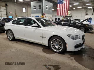 2015 BMW 7 Series 750i xDrive with VIN WBAYB6C54FD965787, listed as a Copart auction lot 89061355 with 104,633 mi miles and Salvage Title. Bid and sale history available at carsss.com. Image 4.