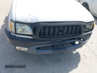 2002 Toyota Tacoma z VIN 5TENL42N62Z033844, wystawiony jako IAAI lot #42403317 z przebiegiem 130 961 mil mil oraz . Historia ofert i sprzedaży dostępna na DreamBid. Obrazek 6.