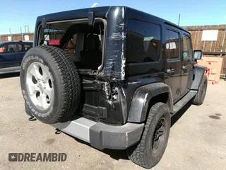 2015 Jeep Wrangler Unlimited Sahara with VIN 1C4BJWEG0FL568237, listed as a IAAI auction lot 41697726 with 82,751 mi miles. Bid and sale history available at carsss.com. Image 4.