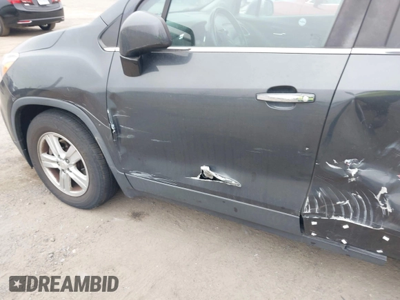 2018 Chevrolet Trax LT with VIN 3GNCJLSB2JL409509, listed as a IAAI auction lot 41800104 with 84,630 mi miles and . Bid and sale history available at carsss.com. Image 6.