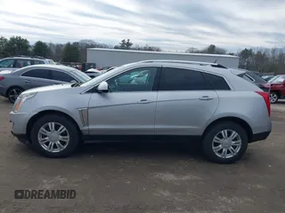 2014 Cadillac SRX Luxury Collection z VIN 3GYFNEE33ES670356, wystawiony jako IAAI lot #42008087 z przebiegiem 59 953 mil mil oraz . Historia ofert i sprzedaży dostępna na DreamBid. Obrazek 15.
