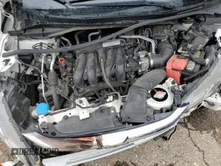 2020 Honda Fit Sport z VIN 3HGGK5H60LM715068, wystawiony jako Copart lot #57706105 z przebiegiem Nie podano mil oraz Nie do naprawy • Non repairable. Historia ofert i sprzedaży dostępna na DreamBid. Obrazek 11.