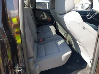 2018 GMC Sierra 1500 SLE z VIN 1GTV2MEC3JZ143967, wystawiony jako IAAI lot #41853850 z przebiegiem 80 205 mil mil oraz . Historia ofert i sprzedaży dostępna na DreamBid. Obrazek 8.
