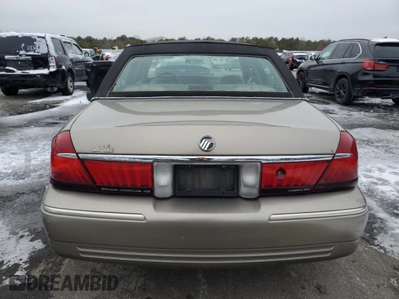 2001 Mercury Grand Marquis GS z VIN 2MEFM74W11X701900, wystawiony jako Copart lot #41913965 z przebiegiem 79 360 mil mil oraz Czysty tytuł • Clean title. Historia ofert i sprzedaży dostępna na DreamBid. Obrazek 6.