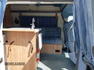 1991 Ford Econoline Cargo with VIN 1FDGS24H5MHB29665, listed as a IAAI auction lot 42136723 with 94,232 mi miles and . Bid and sale history available at DreamBid. Image 8.