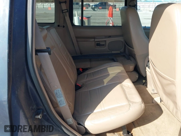 1999 Ford Explorer XLT z VIN 1FMZU32E6XUA07927, wystawiony jako IAAI lot #41489418 z przebiegiem 246 806 mil mil oraz . Historia ofert i sprzedaży dostępna na DreamBid. Obrazek 8.