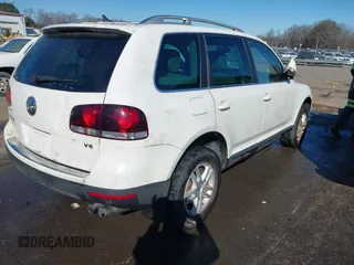 2008 Volkswagen Touareg V6 with VIN WVGBE77L48D033523, listed as a IAAI auction lot 41076281 with 202,286 mi miles and . Bid and sale history available at DreamBid. Image 4.