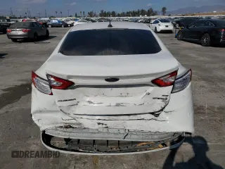 2016 Ford Fusion SE Hybrid с VIN 3FA6P0LU2GR360066, выставлен на аукционе Copart как лот 84767824 с пробегом 153 044 миль миль и Списание • Salvage title. История ставок и продаж доступна на DreamBid. Изображение 6.