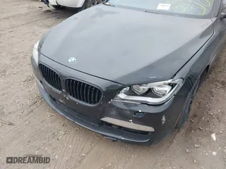 2015 BMW 7 Series 750i xDrive with VIN WBAYB6C57FD965802, listed as a IAAI auction lot 40588698 with 999,999 mi miles. Bid and sale history available at carsss.com. Image 6.